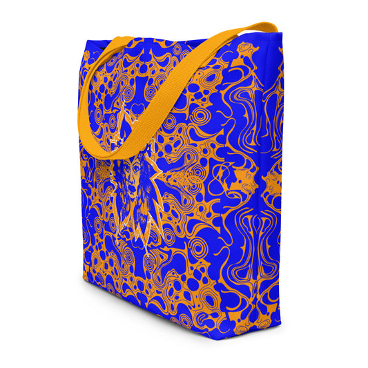 Bold blue and orange tote bag from Kloe Store featuring intricate abstract patterns and a central artistic face design, offering a stylish and edgy streetwear look.