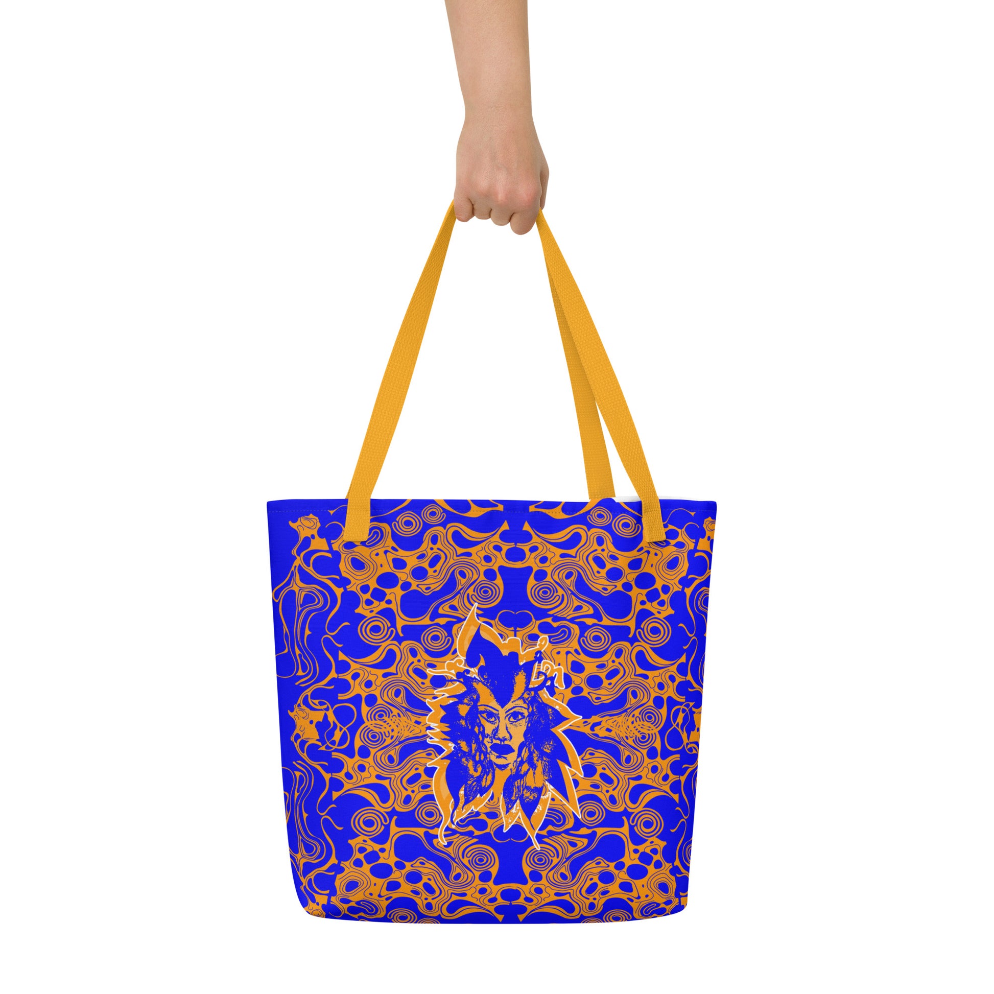 Bold blue and orange tote bag from Kloe Store featuring intricate abstract patterns and a central artistic face design, offering a stylish and edgy streetwear look.