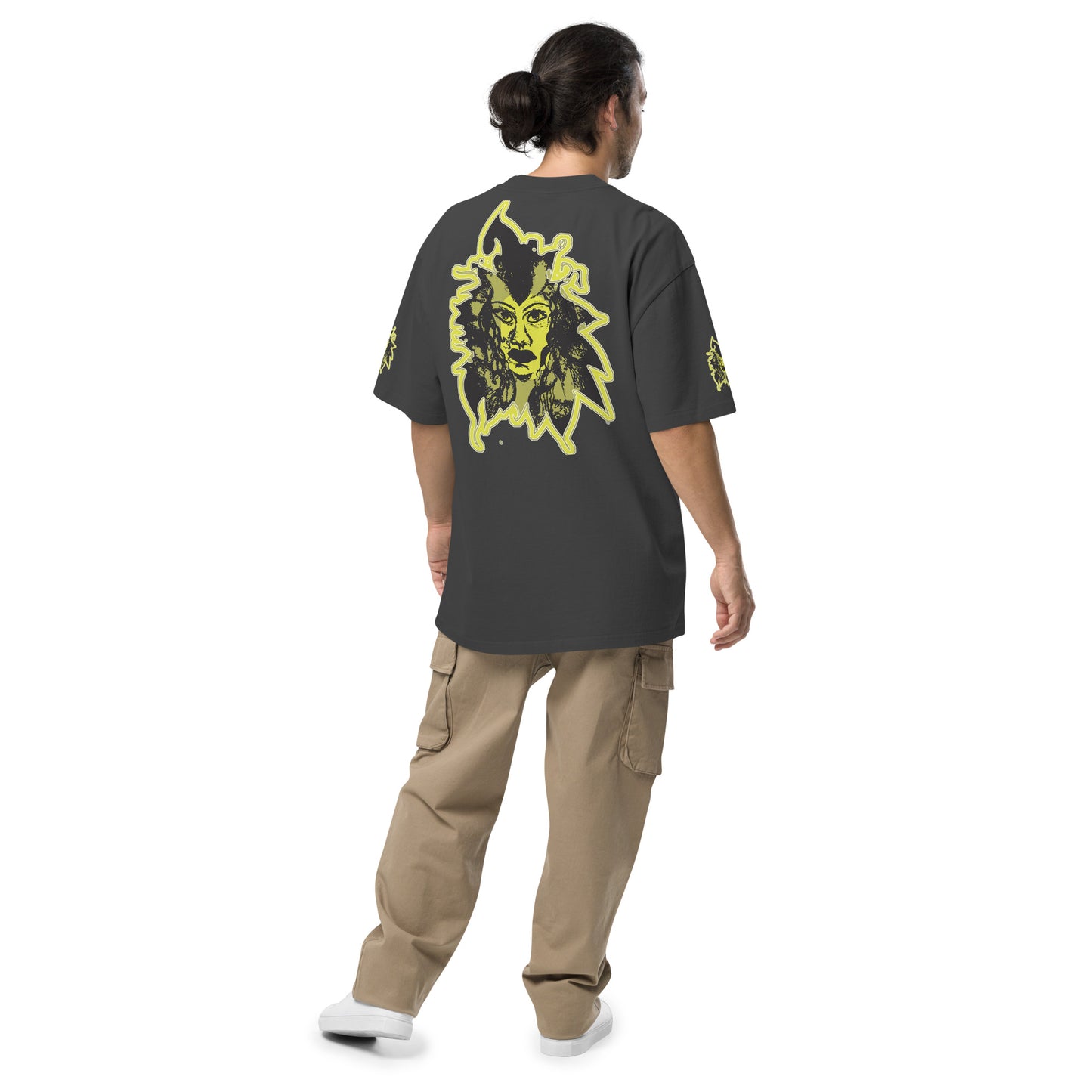 Black unisex oversized t-shirt with a bold yellow hand-drawn face graphic on the back, embodying culturally inspired fashion and modern boho style. The front features the K.L.O.E. logo and ‘KEEN, LIBERATED, ORIGINAL, ENDLESS’ text, celebrating individuality and expressive fashion for a contemporary, liberated lifestyle.