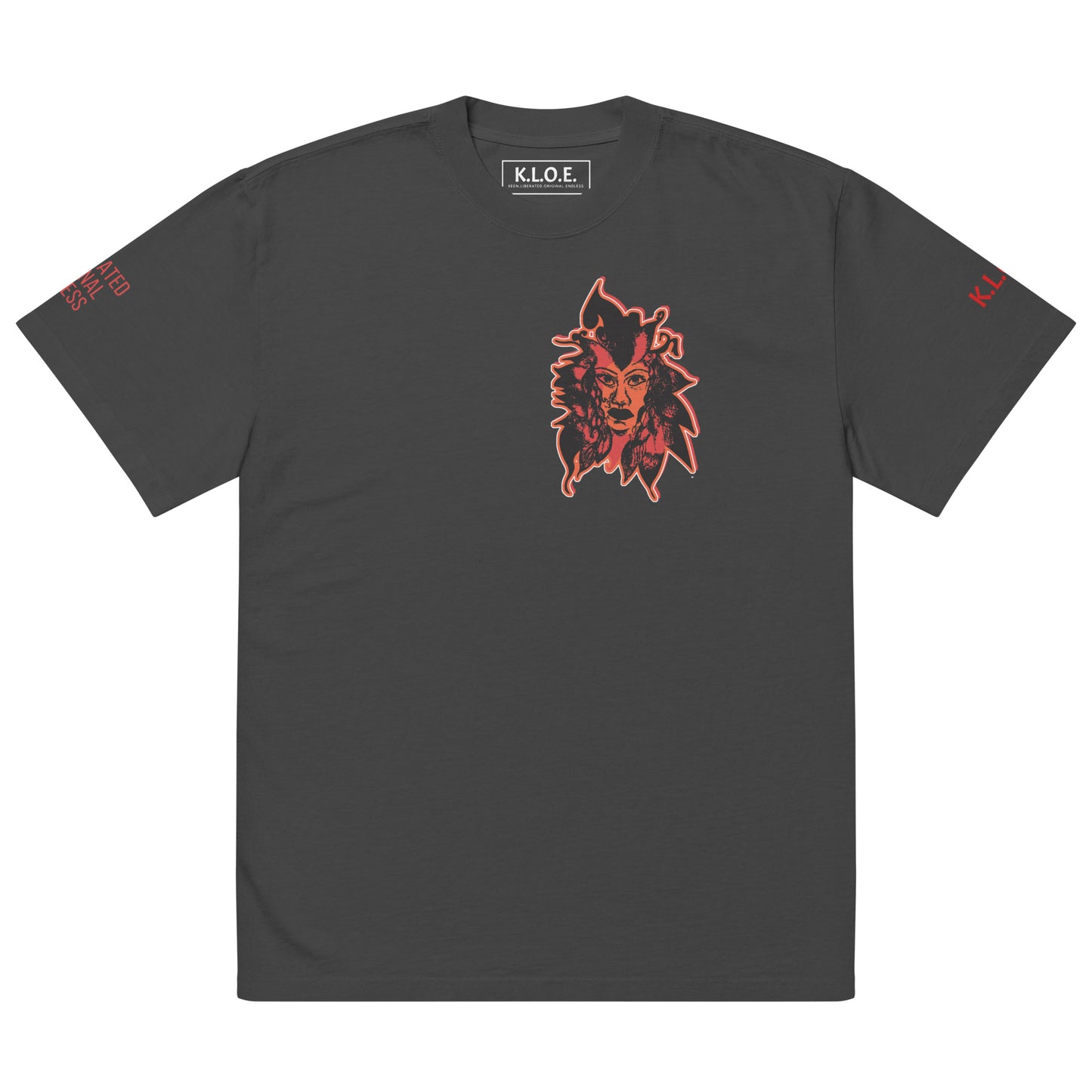 Black unisex oversized t-shirt featuring a striking red, hand-drawn face graphic on the back and front, inspired by global artistry and expressive fashion. The sleeve showcases ‘KEEN, LIBERATED, ORIGINAL, ENDLESS,’ embodying modern boho style and empowering individuality. A statement piece for those embracing contemporary, culturally inspired fashion.