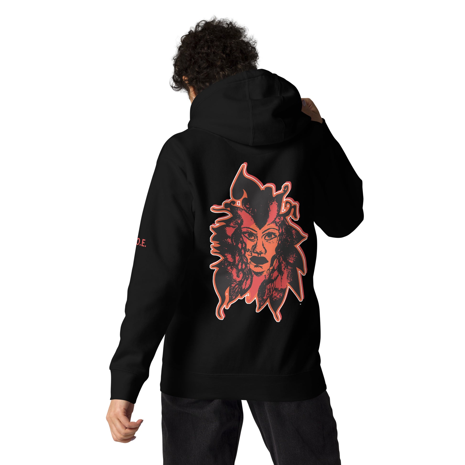 Black unisex hoodie featuring a striking red, hand-drawn face graphic on the back and front, inspired by global artistry and expressive fashion. The sleeve showcases ‘KEEN, LIBERATED, ORIGINAL, ENDLESS,’ embodying modern boho style and empowering individuality. A statement piece for those embracing contemporary, culturally inspired fashion.