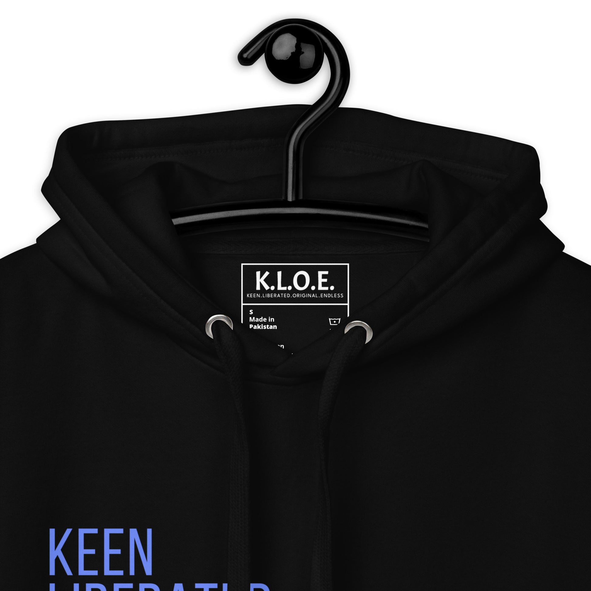 Black unisex K.L.O.E hoodie featuring a bold, hand-drawn blue graphic of an expressive face on the back, inspired by global artistry and modern boho style. The front showcases ‘KEEN, LIBERATED, ORIGINAL, ENDLESS’ text, celebrating individuality and self-expression. A contemporary fashion statement for those embracing artistic clothing and culturally inspired style.