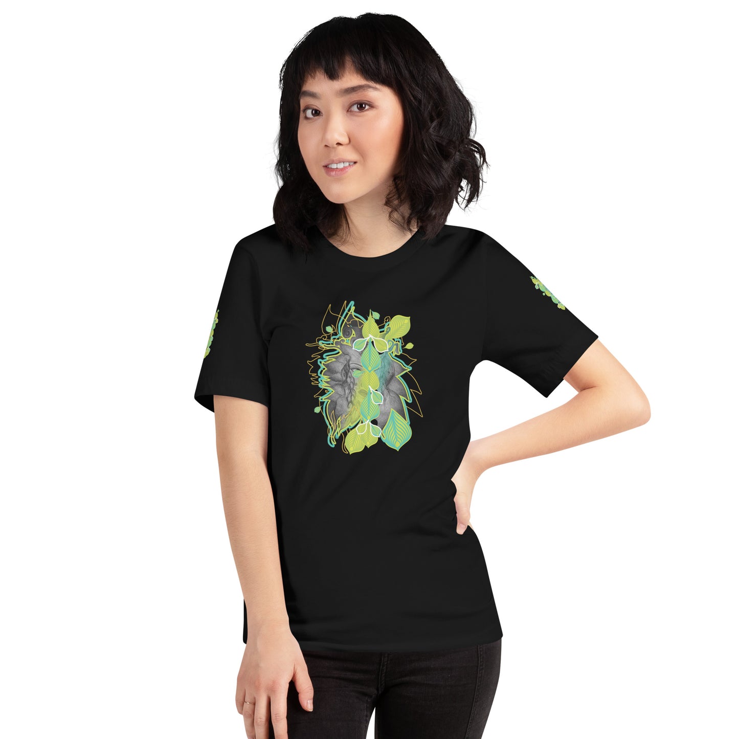 Front view of black K.L.O.E. t-shirt with vibrant green and yellow leaf patterns framing a detailed hand-drawn face design. A modern bohemian style statement that celebrates individuality, artistic expression, and culturally inspired fashion, on a model.