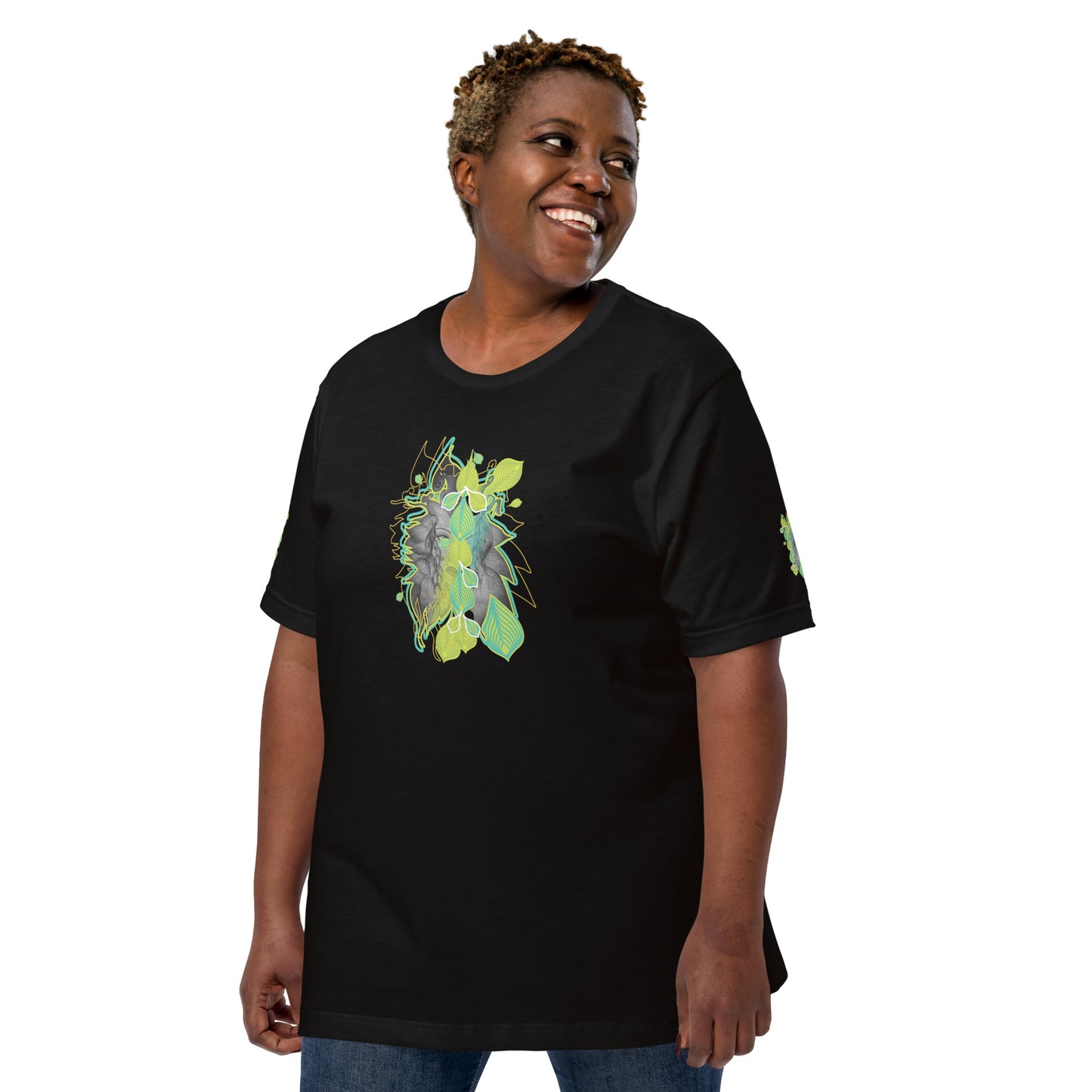 Front view of black K.L.O.E. t-shirt with vibrant green and yellow leaf patterns framing a detailed hand-drawn face design. A modern bohemian style statement that celebrates individuality, artistic expression, and culturally inspired fashion, on a model.