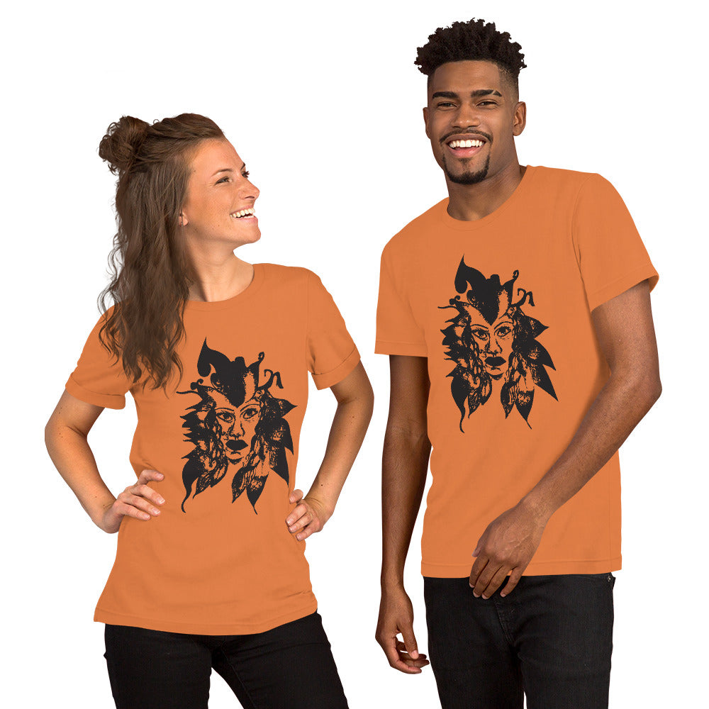 The couple wearing orange K.L.O.E. T-shirt featuring a culturally inspired, hand-drawn black graphic of a bold, expressive face surrounded by intricate details, celebrating individuality and artistic self-expression in modern bohemian style fashion.