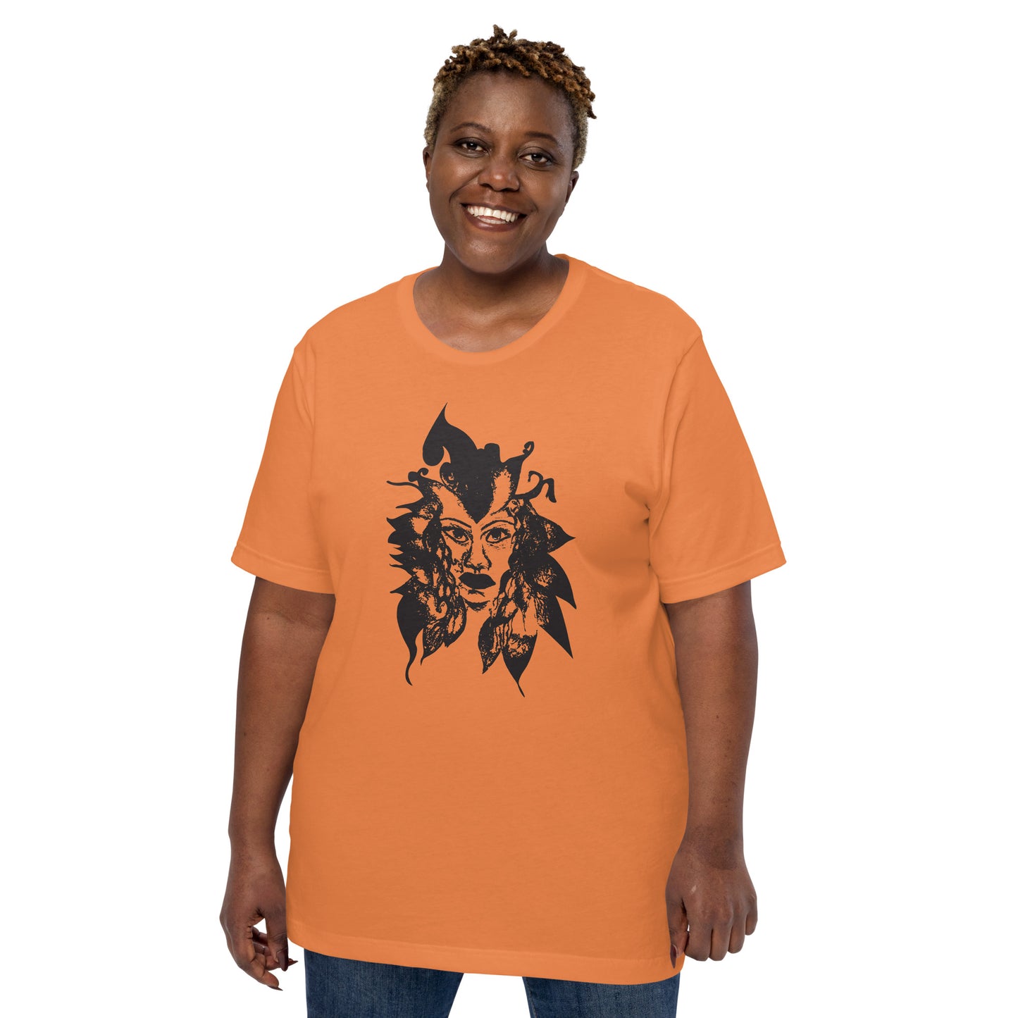 Orange K.L.O.E. T-shirt featuring a culturally inspired, hand-drawn black graphic of a bold, expressive face surrounded by intricate details, celebrating individuality and artistic self-expression in modern bohemian style fashion, on a model.