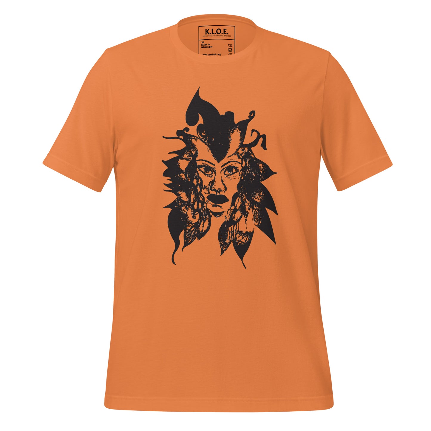 Orange K.L.O.E. T-shirt featuring a culturally inspired, hand-drawn black graphic of a bold, expressive face surrounded by intricate details, celebrating individuality and artistic self-expression in modern bohemian style fashion.Orange K.L.O.E. T-shirt featuring a culturally inspired, hand-drawn black graphic of a bold, expressive face surrounded by intricate details, celebrating individuality and artistic self-expression in modern bohemian style fashion.