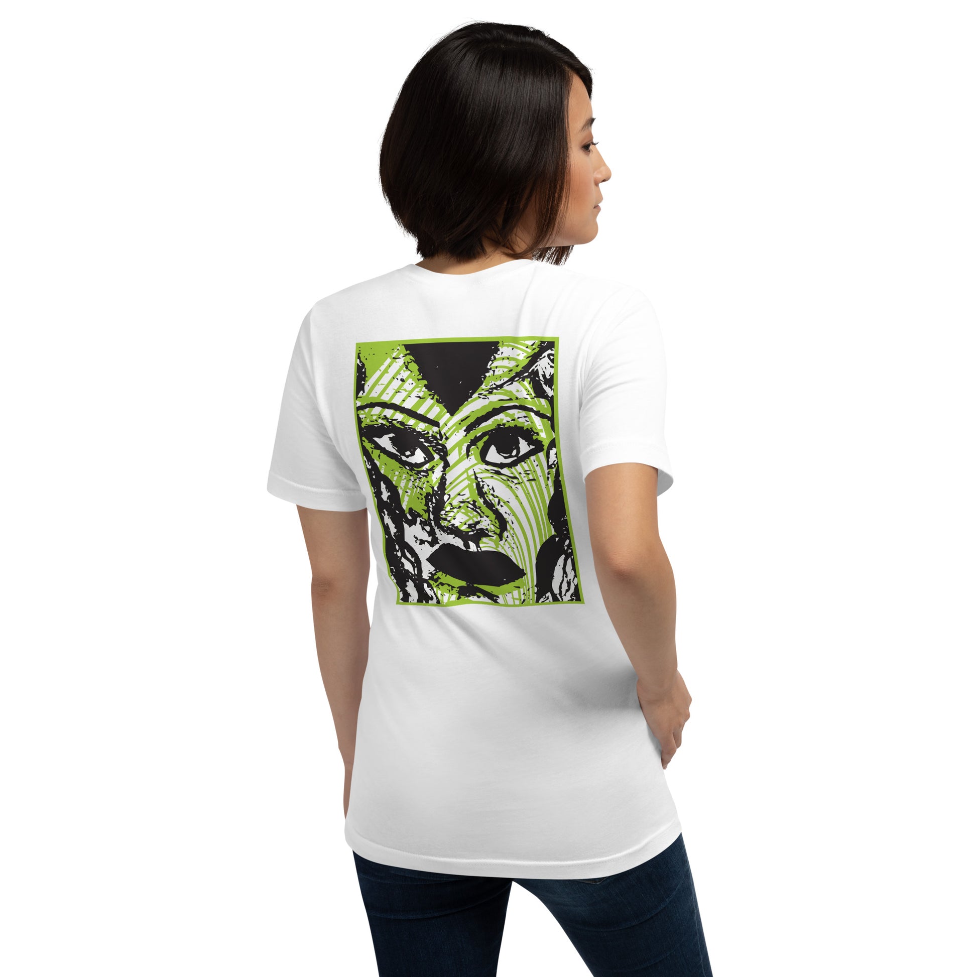 Back view of a white K.L.O.E. T-shirt featuring a bold hand-drawn face design in black and vibrant green on the back, surrounded by sharp, abstract patterns. Highlights artistic self-expression, individuality, and modern bohemian style fashion.