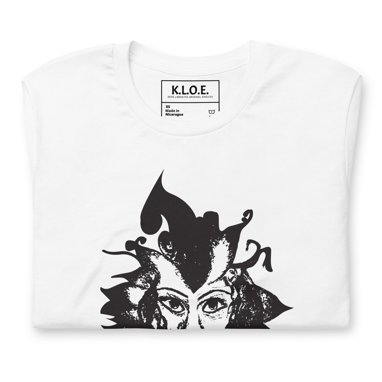 The view of the inside label of the white K.L.O.E. T-shirt featuring a culturally inspired, hand-drawn black graphic of a bold, expressive face surrounded by intricate details, celebrating individuality and artistic self-expression in modern bohemian style fashion.