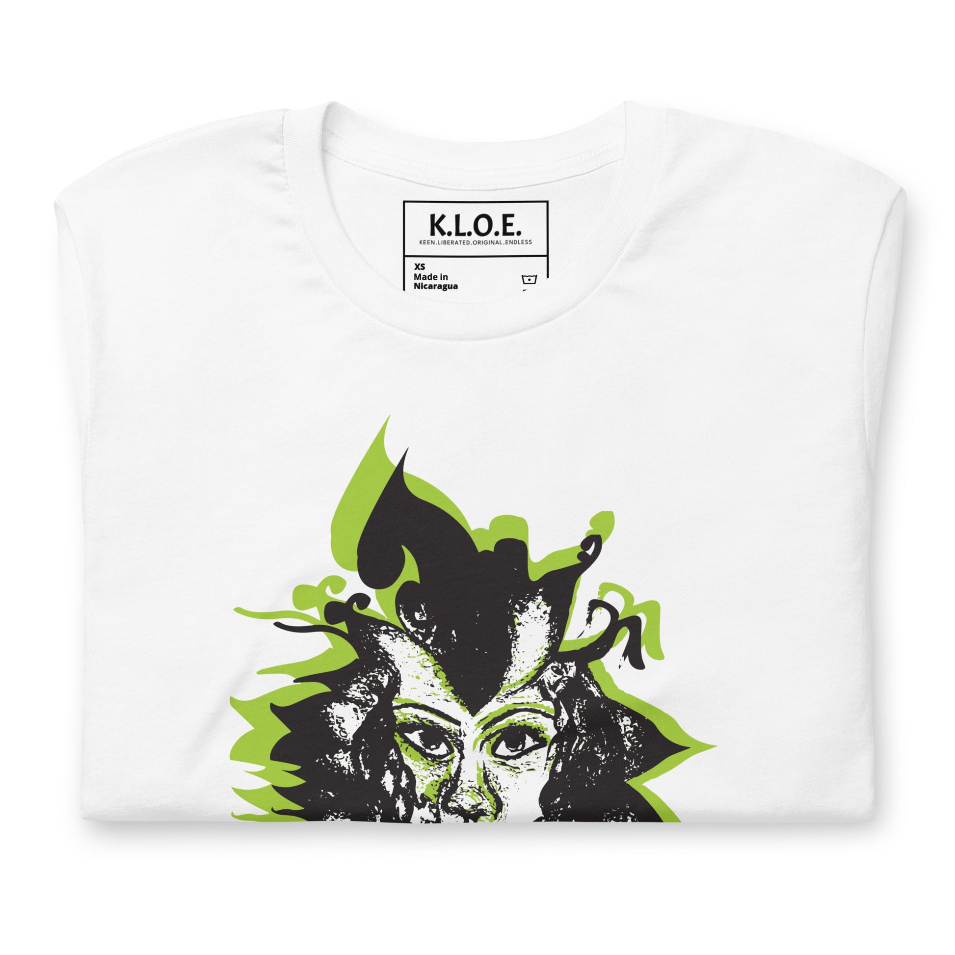 The inside label view of white K.L.O.E. T-shirt featuring a bold hand-drawn face design in black and vibrant green, surrounded by sharp, abstract patterns, celebrating individuality, artistic self-expression, and modern bohemian style fashion.