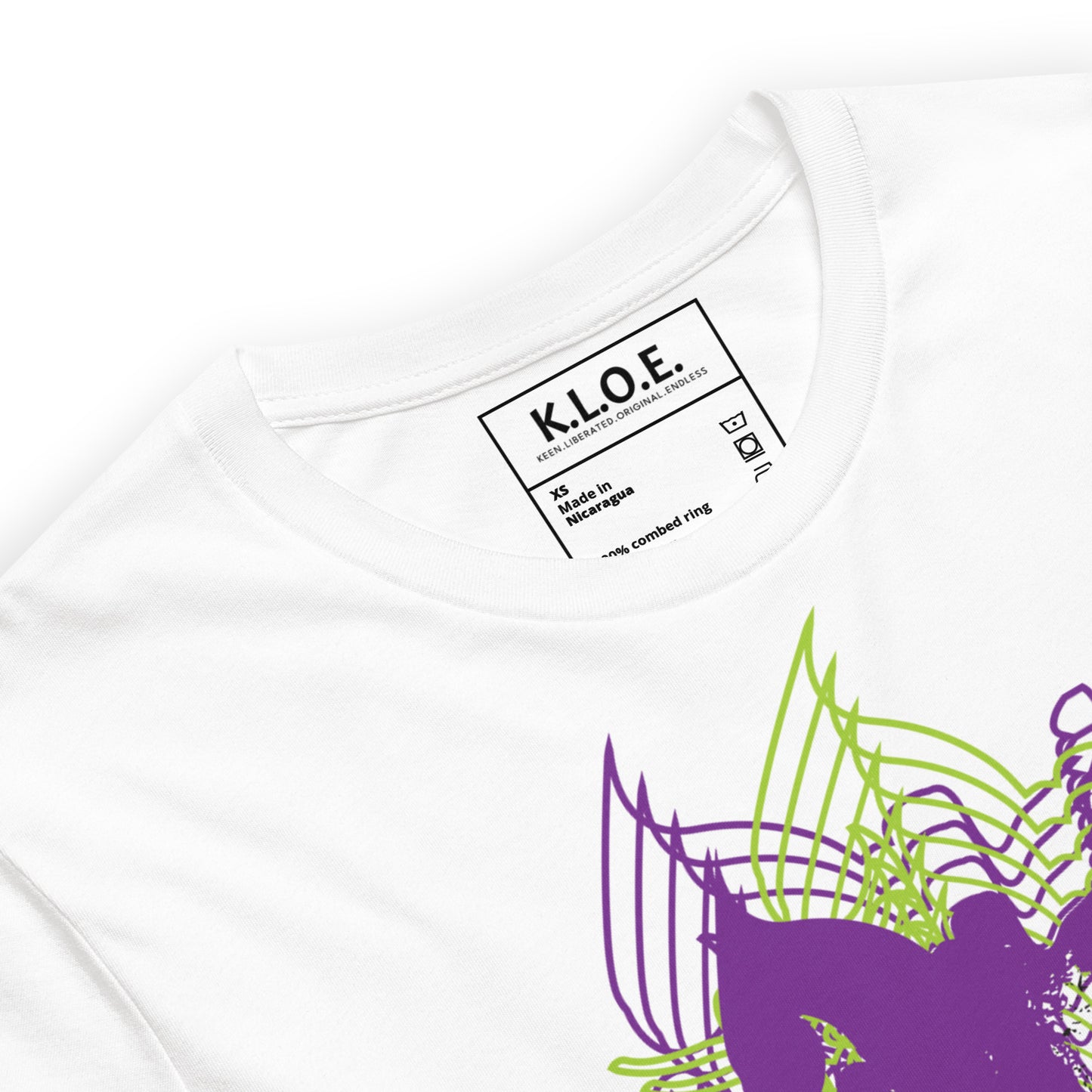 The inside label view of a white K.L.O.E. T-shirt featuring a vibrant hand-drawn face design in bold purple and green, surrounded by geometric and flowing patterns, celebrating individuality, artistic self-expression, and modern bohemian style fashion.