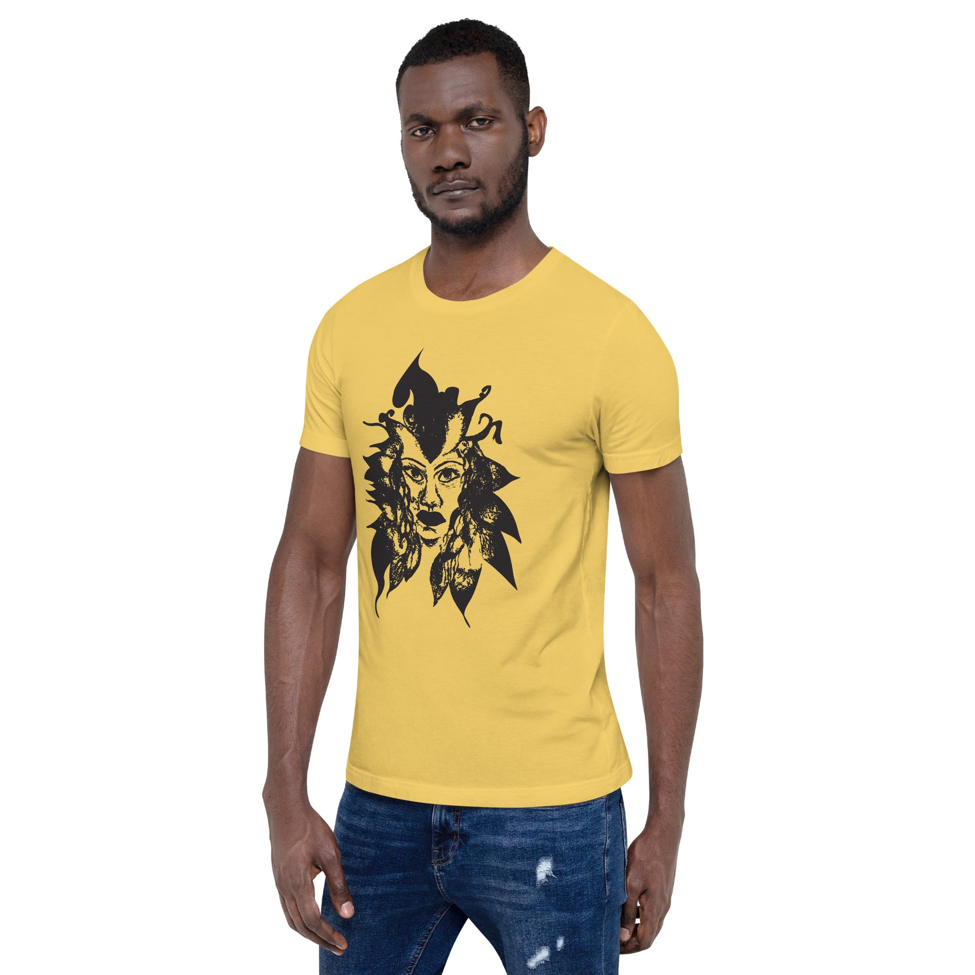 The model wearing yellow K.L.O.E. T-shirt featuring a culturally inspired, hand-drawn black graphic of a bold, expressive face surrounded by intricate details, celebrating individuality and artistic self-expression in modern bohemian style fashion.