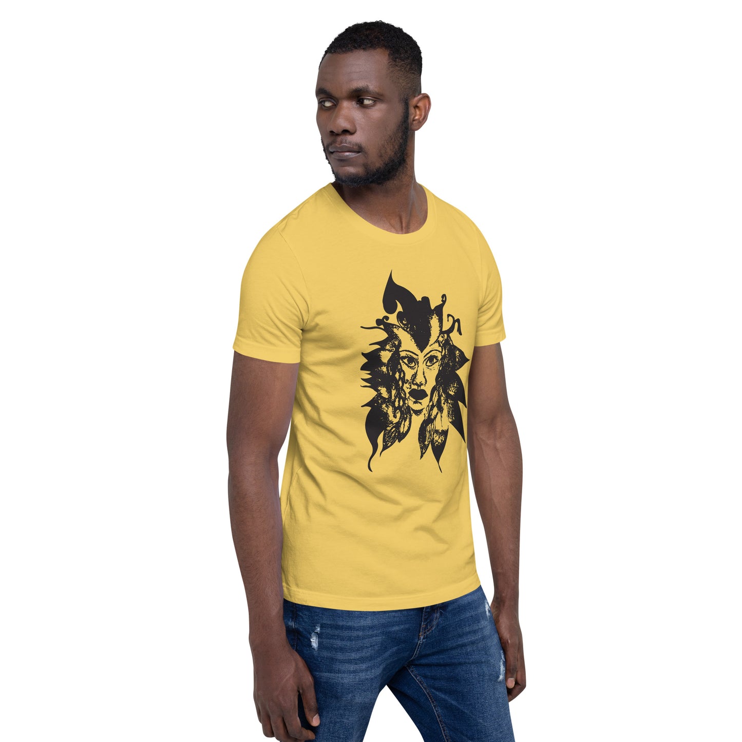 The model wearing yellow K.L.O.E. T-shirt featuring a culturally inspired, hand-drawn black graphic of a bold, expressive face surrounded by intricate details, celebrating individuality and artistic self-expression in modern bohemian style fashion.